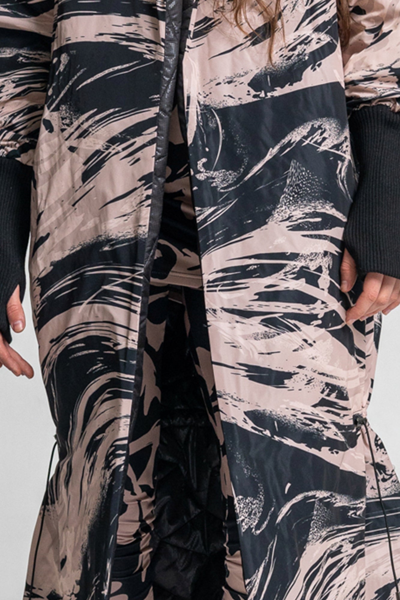 printed maxi coat with drawstring at knees to create a bubbly shape