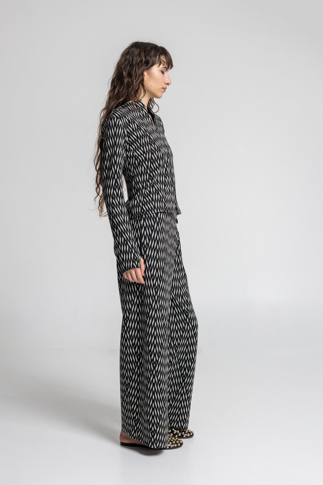 zipped thumbhole cuff jacket between waist and hip length
