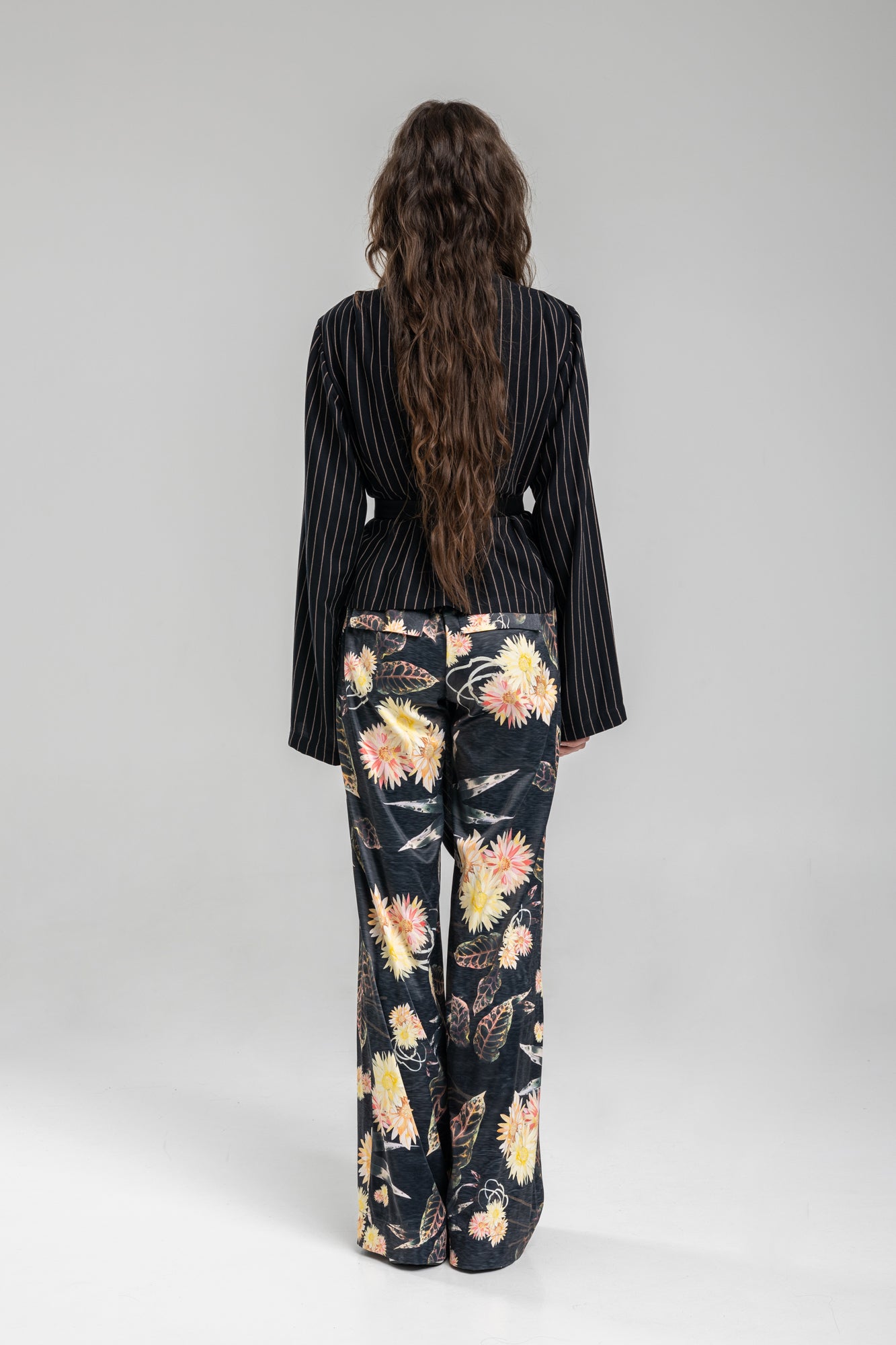 Asymmetric blouse with pinstripe fabric on back