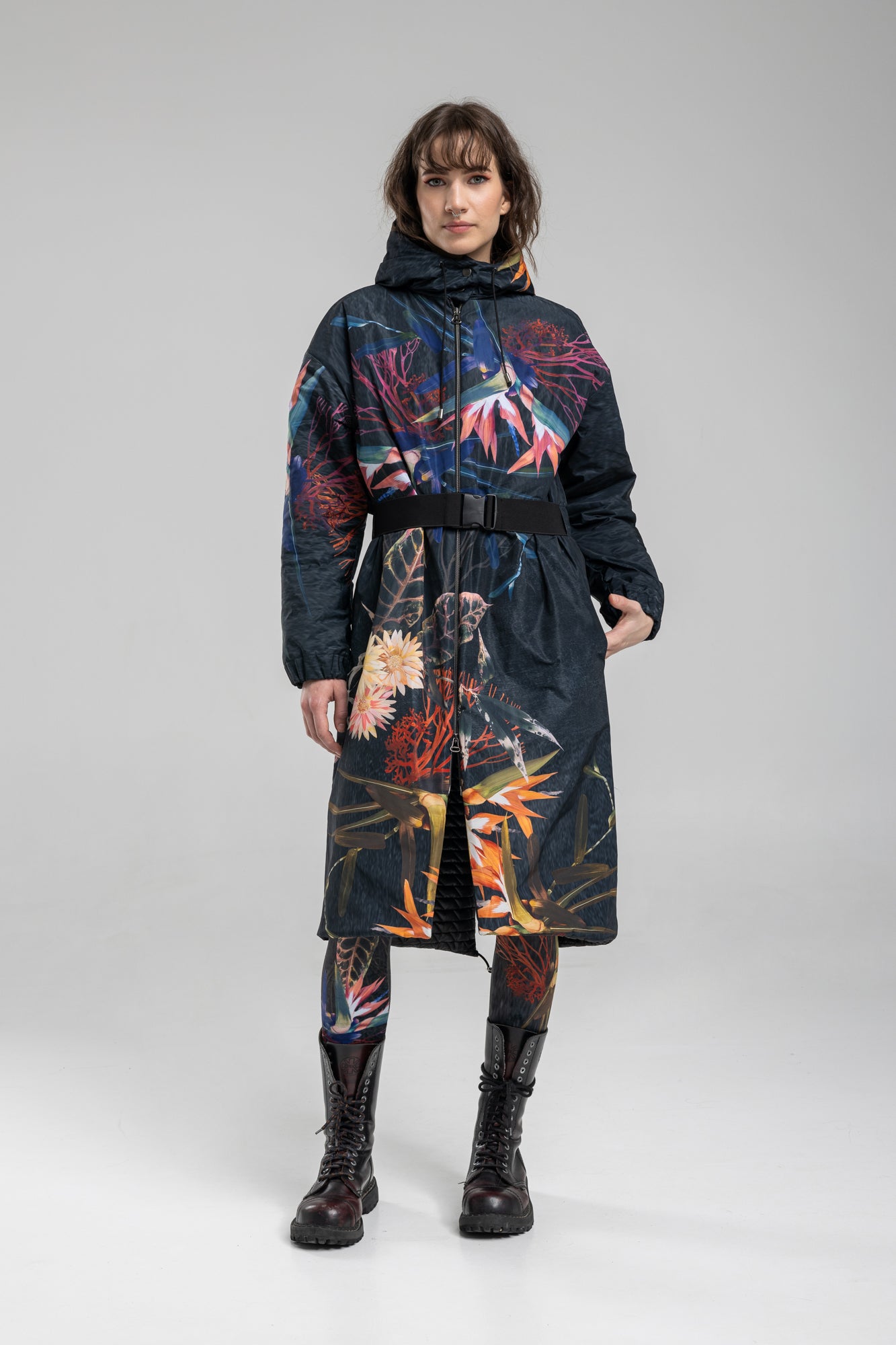 Hooded jacket with inset elastic belt