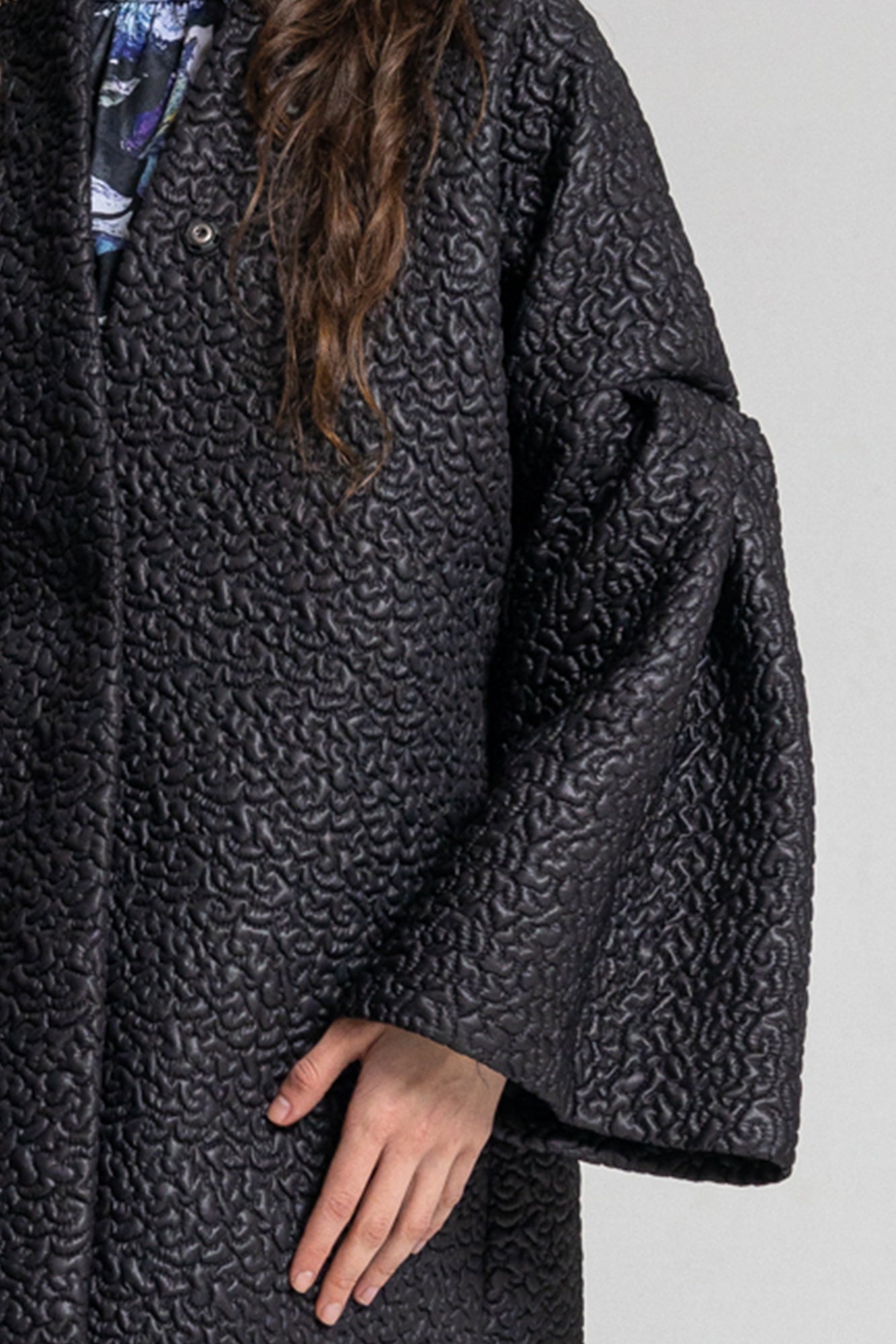 asia inspired quilted over coat flattering v-neckline