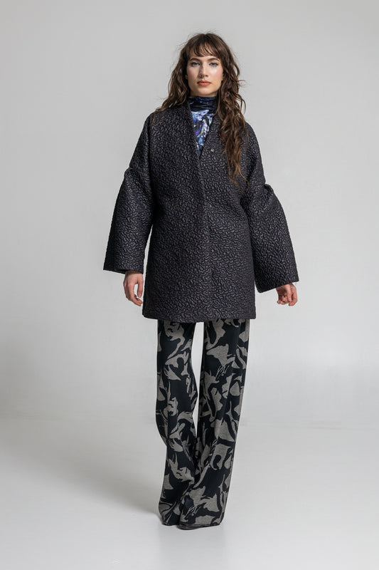 asia inspired quilted jacket with press button closure on front