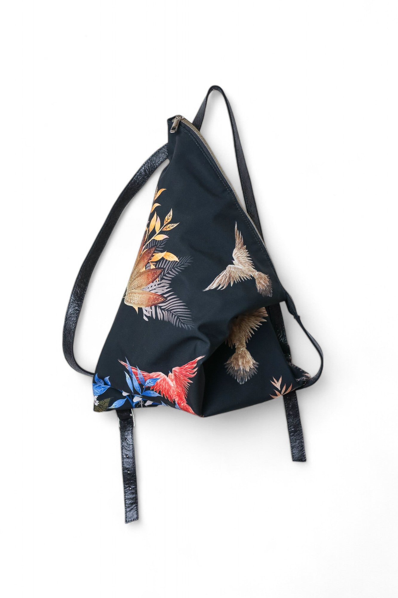 Uniue Printed Textile Backpack with adjustable leather stripes and zip closure