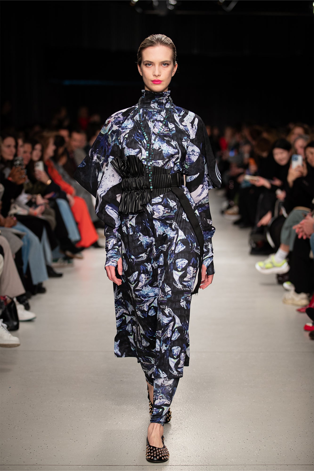 model walking on Budapest Central European Fashion Week runway wearing Dark Crystal Turtleneck Midi Dress