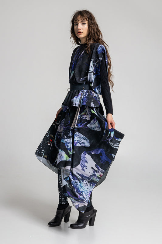 maxi cut dress with fold on one side to create an asymmetric finish