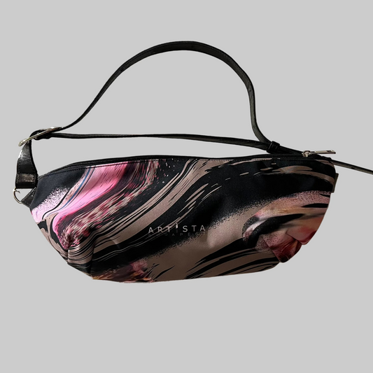 Marbled patterned bag with 'ARISTA' branding on a light background