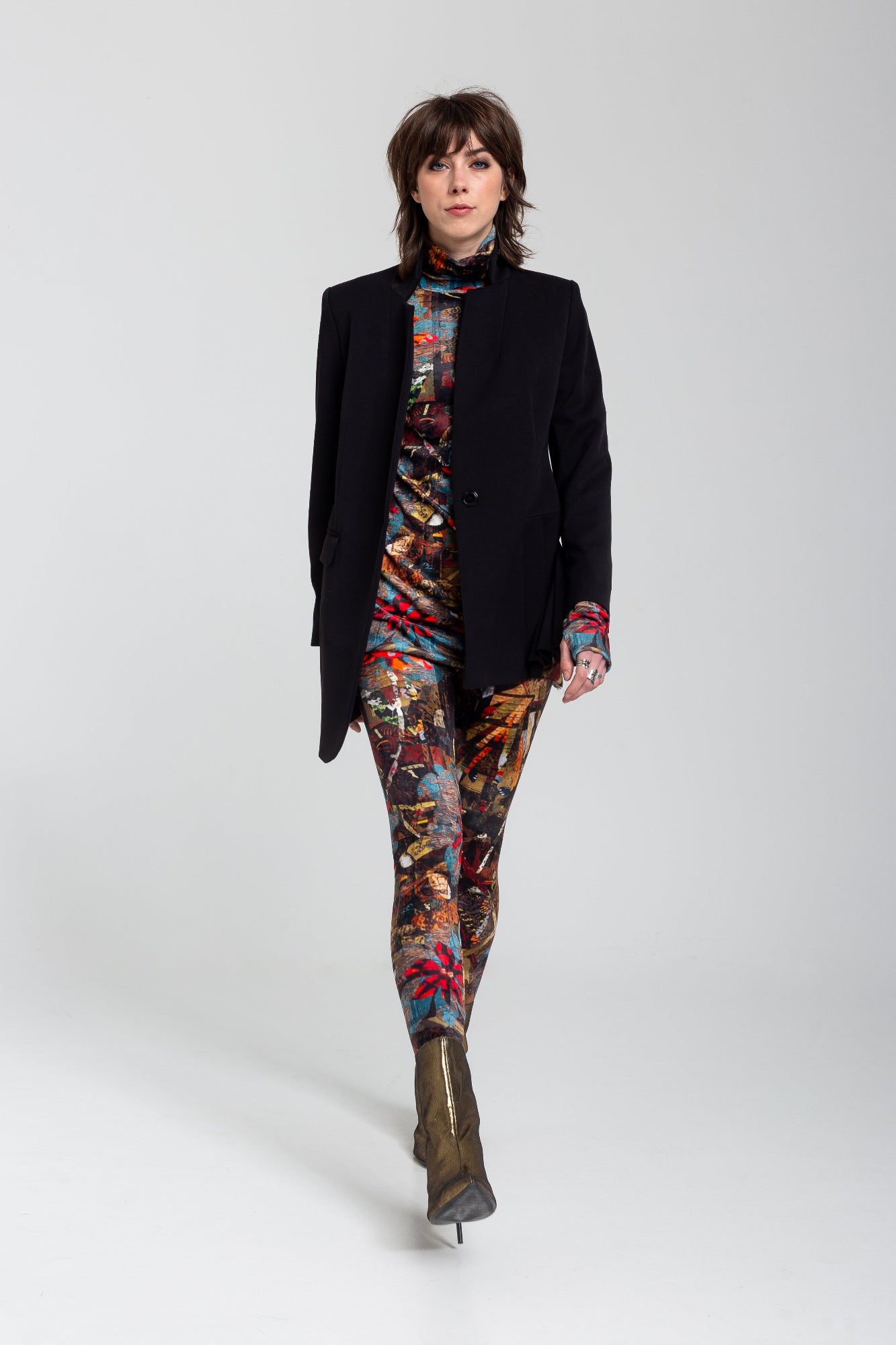 asymmetric cut blazer with one button closure