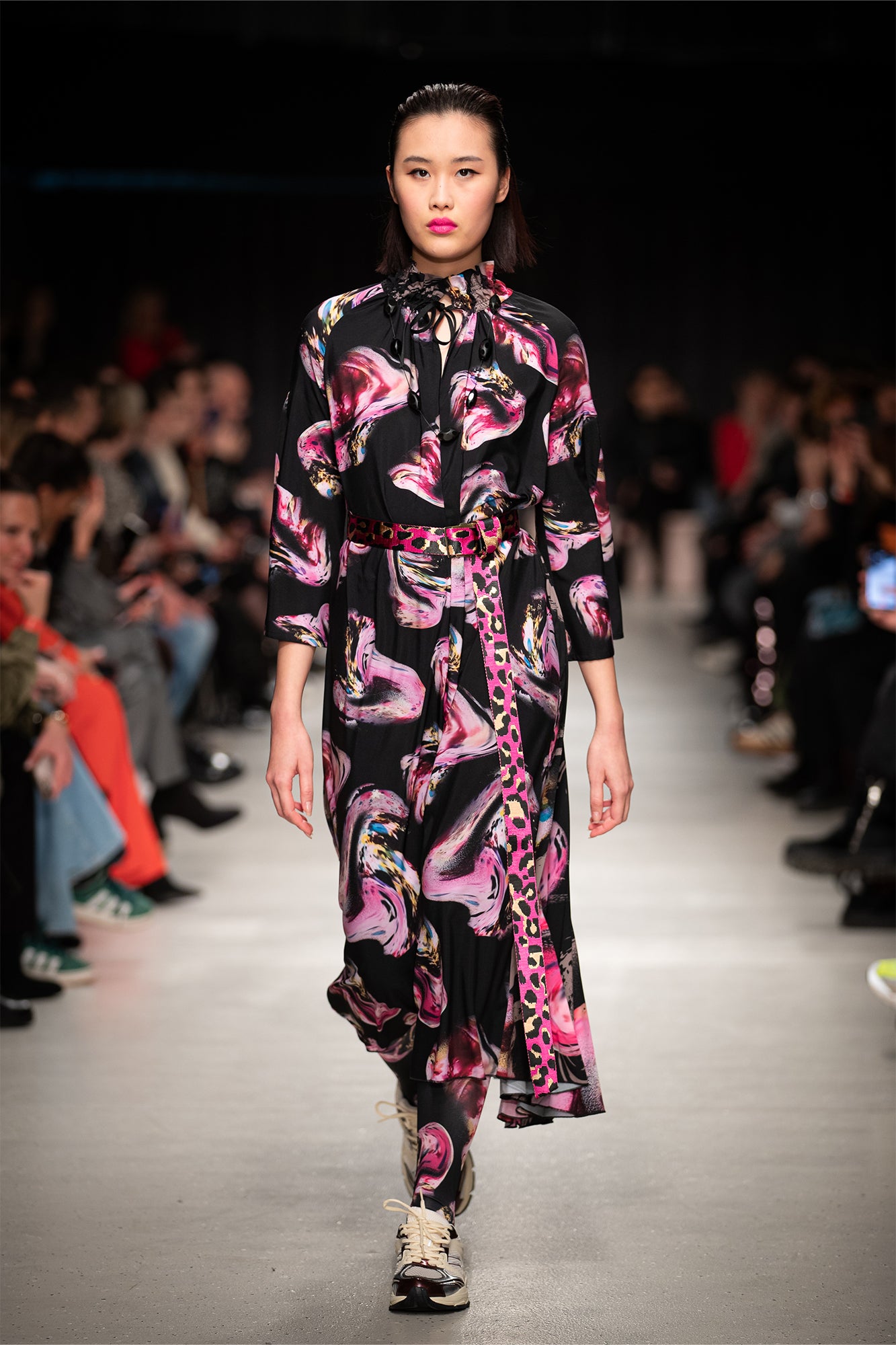 model walking on bcefw runway wearing the rose crystal embellished printed midi dress