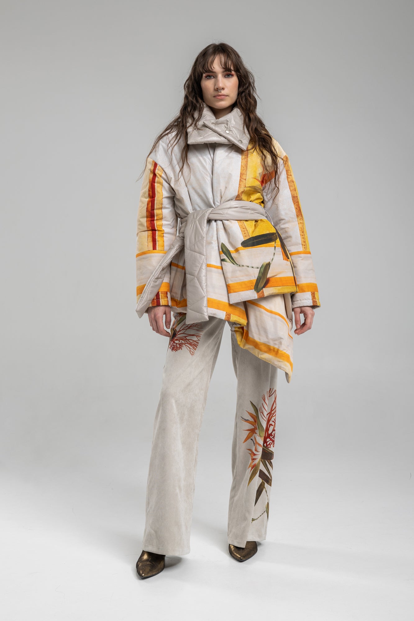 Corduroy pants with asymmetric print
