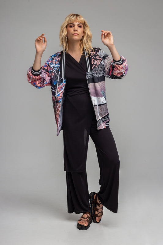 chic feminine full length jumpsuit with wrap detail on front artista budapest