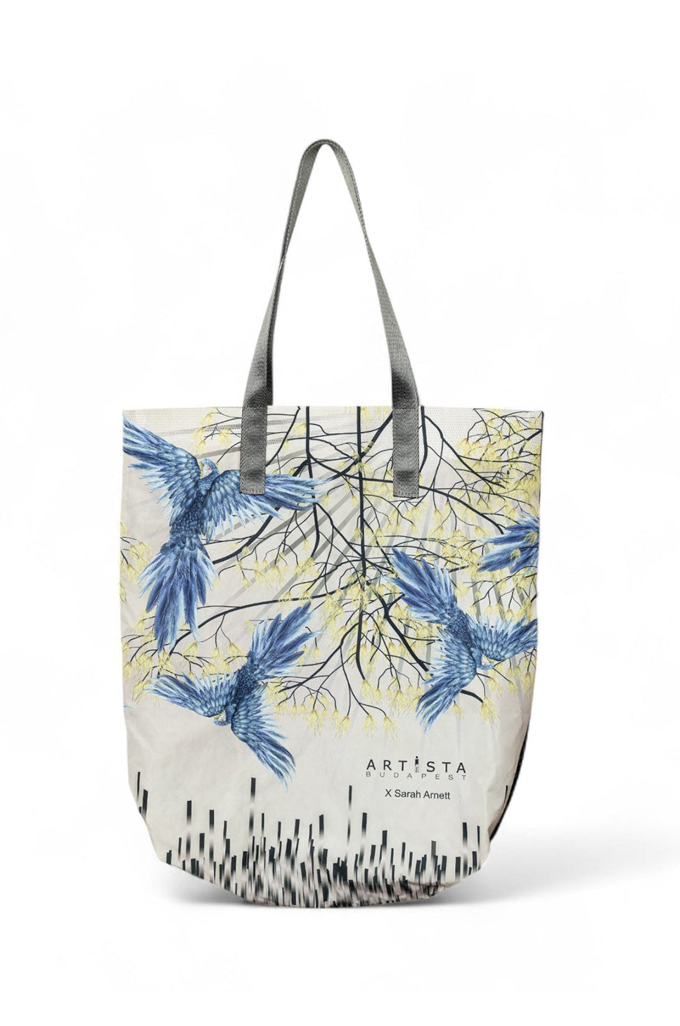 A white and blue floral printed tote bag with a separate pocket and black handles.