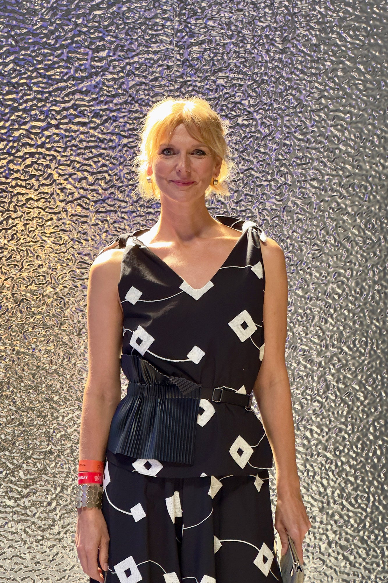 Embroidered top with adjustable straps wearing by Hungarian actress, Judit Rezes at Budapest Central European Fashion Week