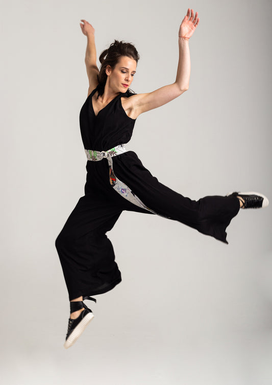 feminine black jumpsuit with zipup closure on front artista budapest