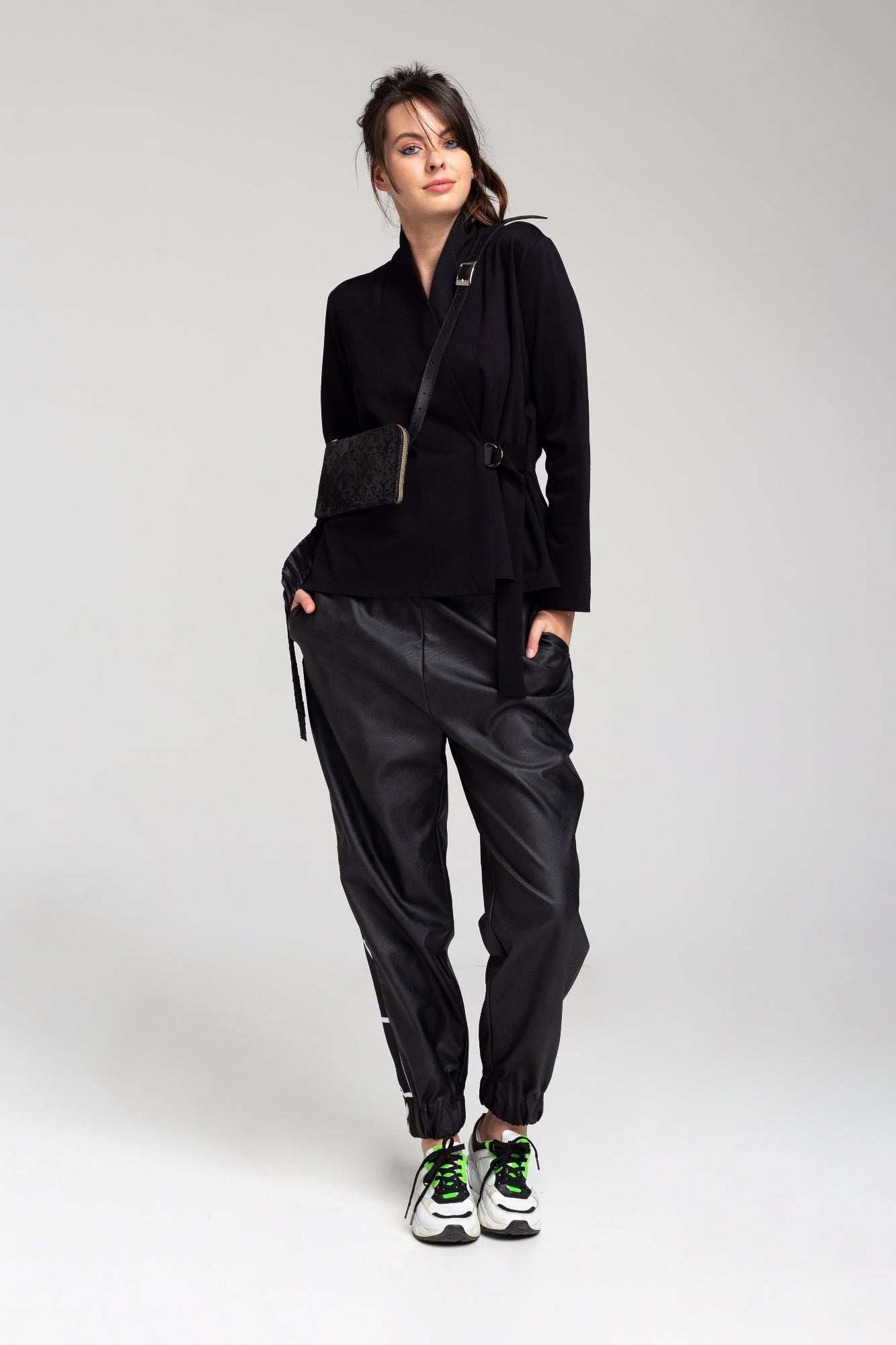 overlapped black jacket with inset belt