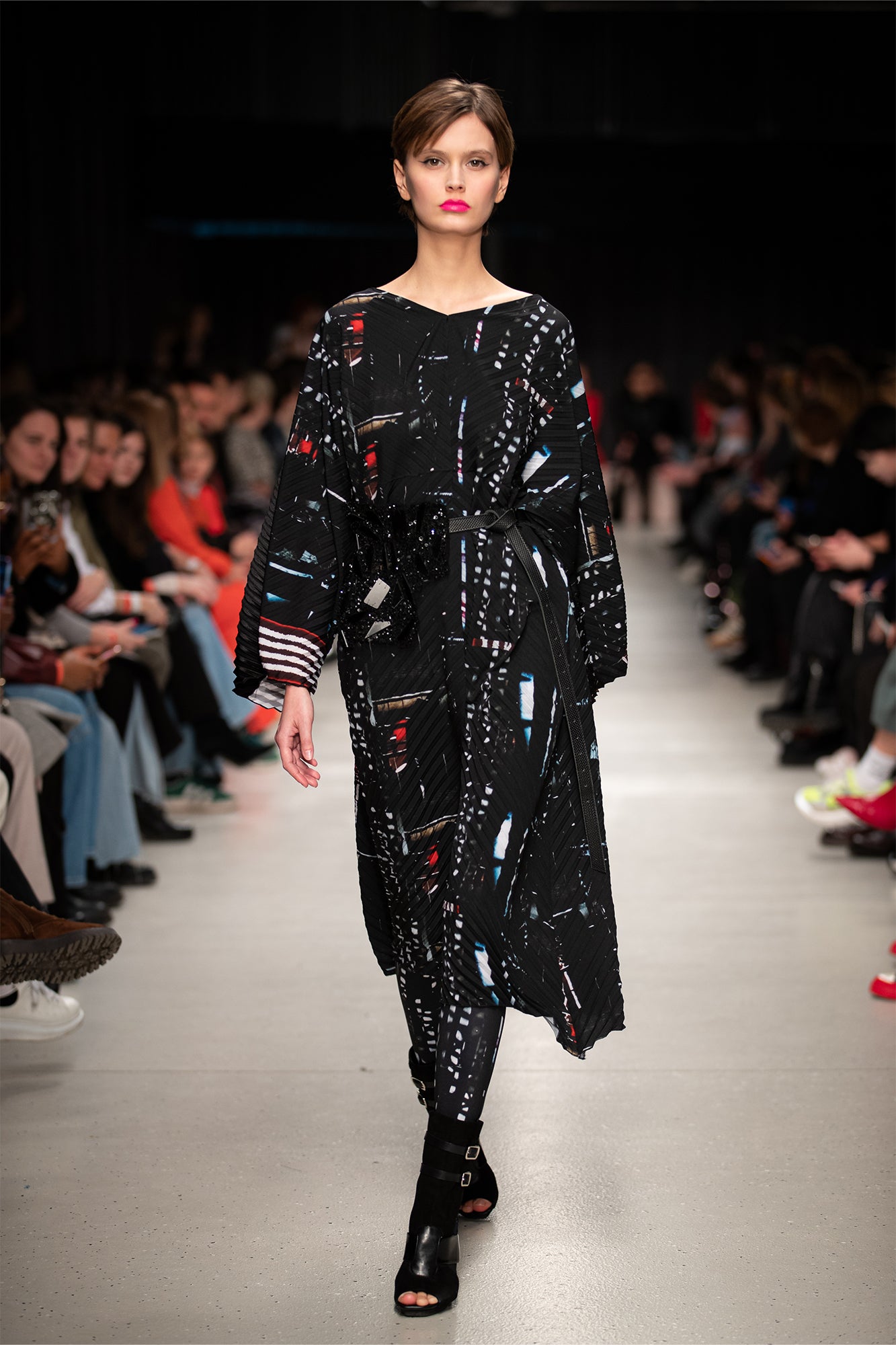 Model wears Bright Pleated Midi Dress on the runway of Budapest Central European Fashion Week