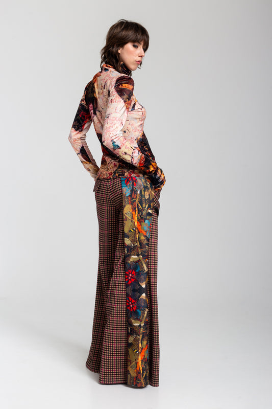 wide palazzo leg pants with unique print detail on one leg