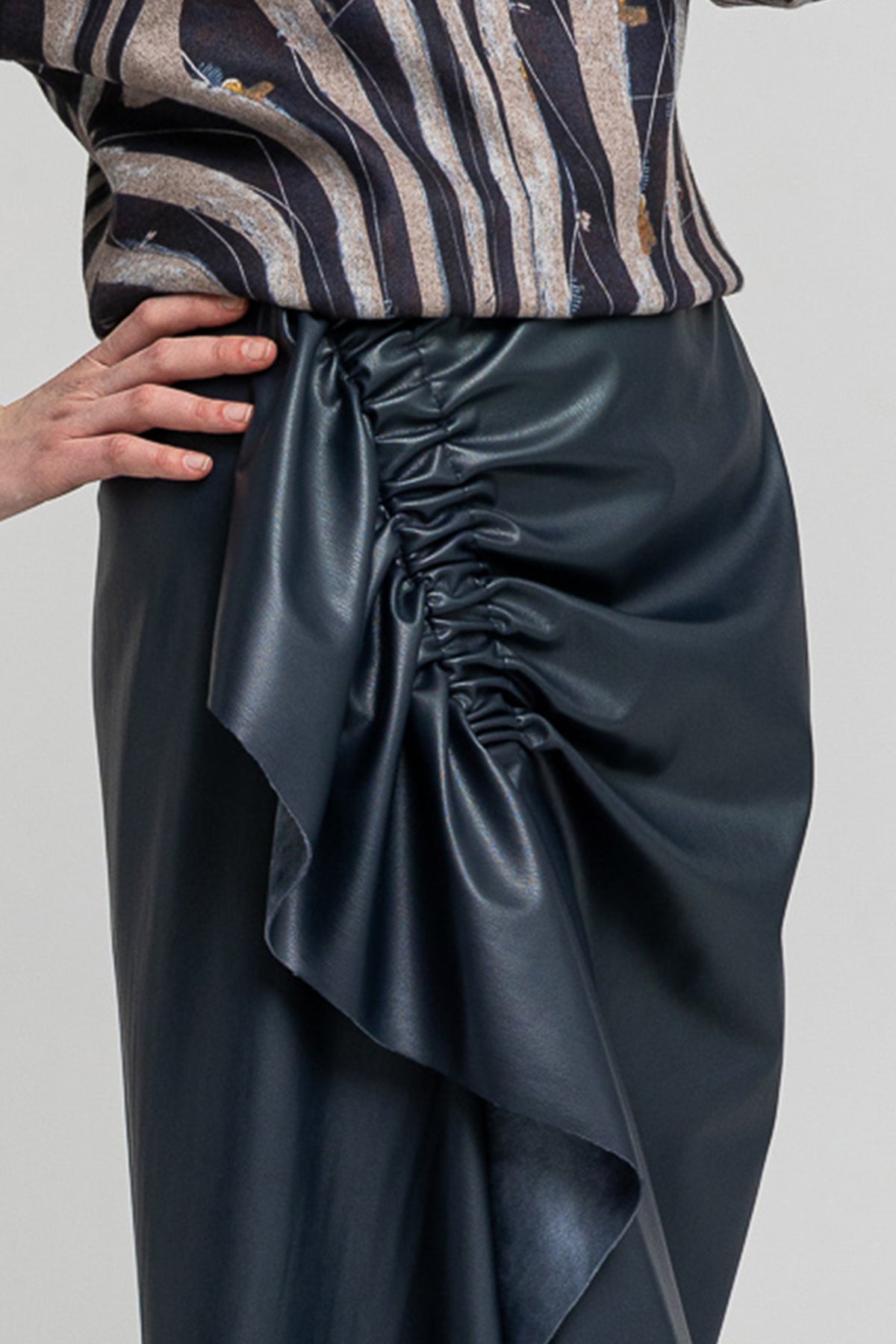 eco-leather midi skirt with gathered detail on front ends in frill artista budapest