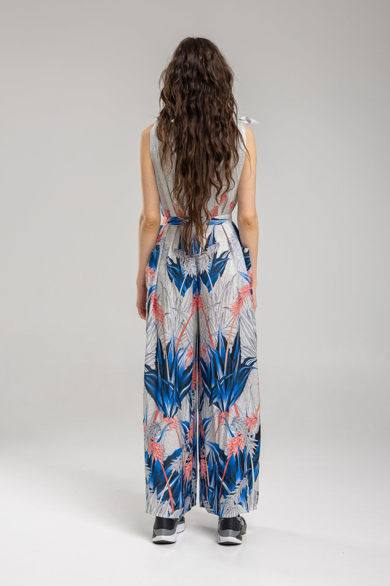 feminine jumpsuit with inset printed tie belt artista budapest