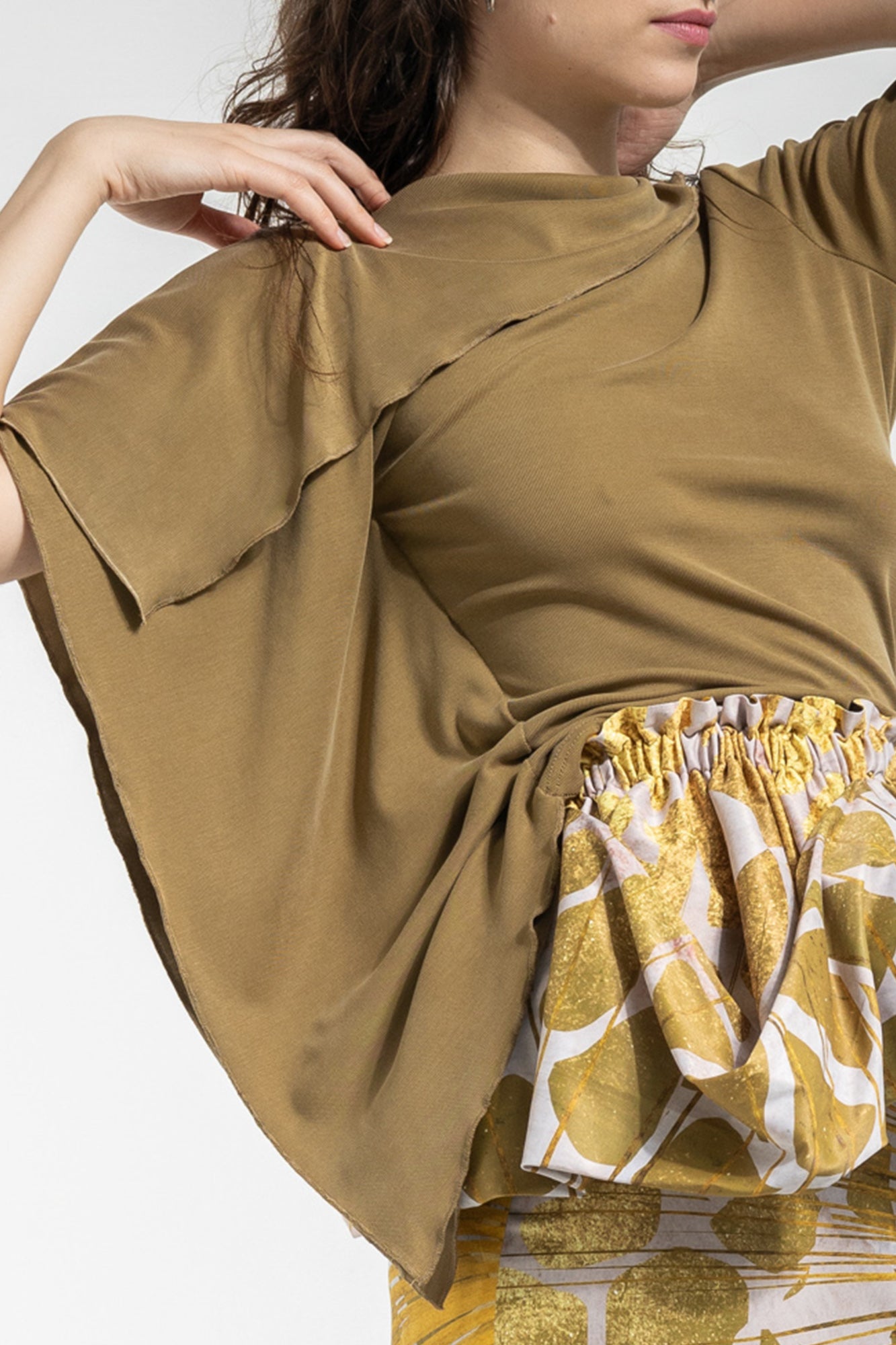 asymmetric sleeves top with generous amount of fabric