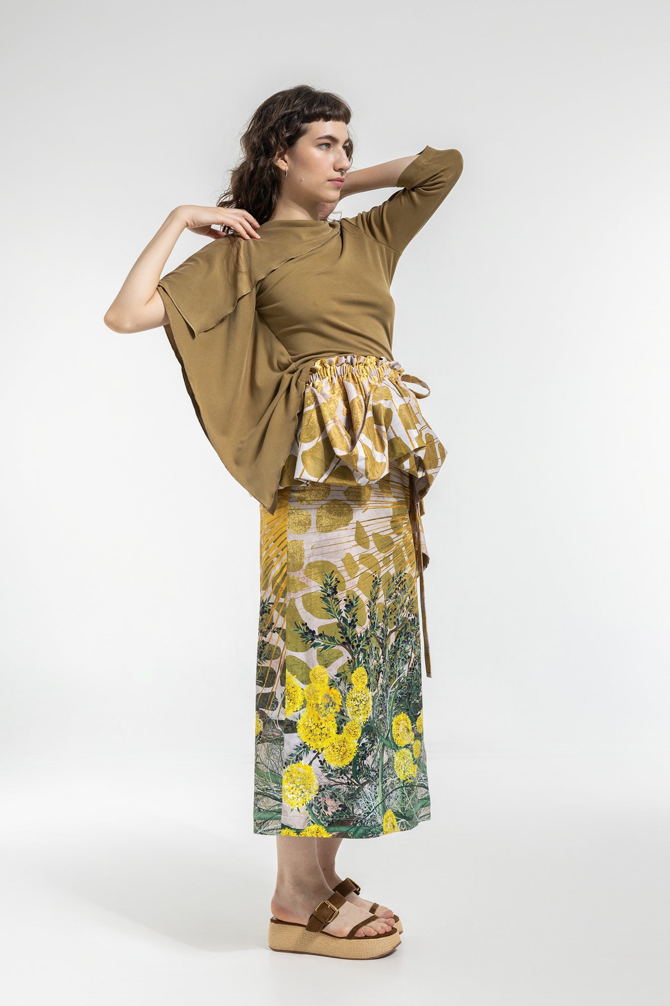 asymmetric sleeves top with scarf-like drape on boat neck