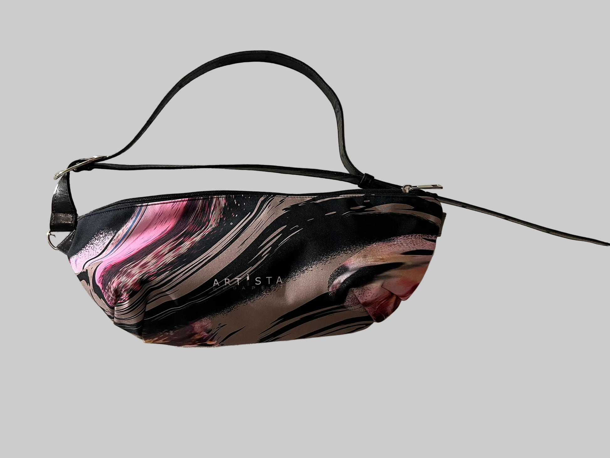 Marbled patterned bag with 'ARISTA' branding on a light background
