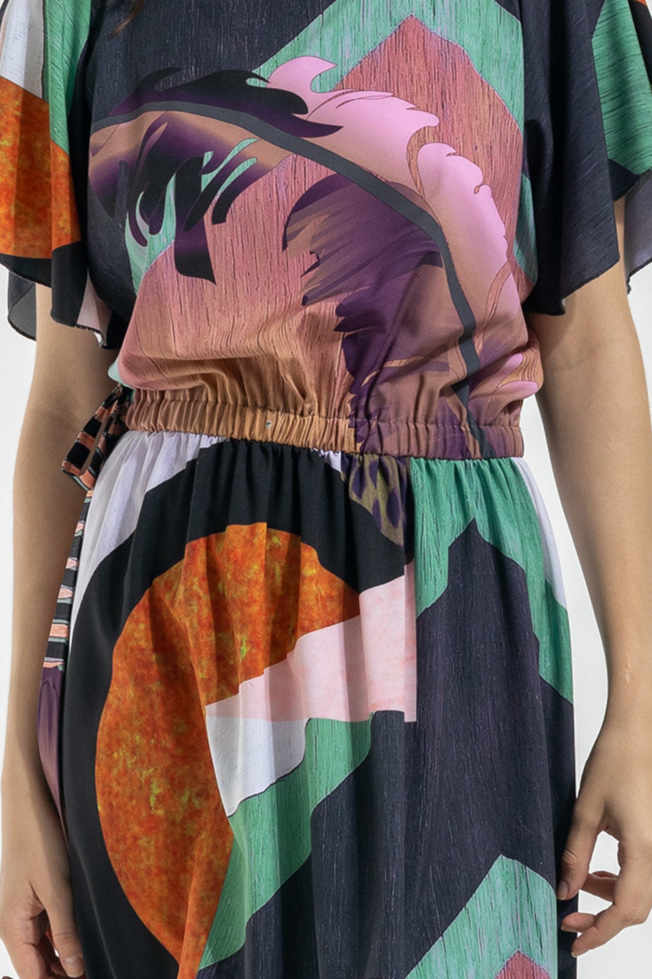 colourful printed maxi dress with exxageretad feather print on front