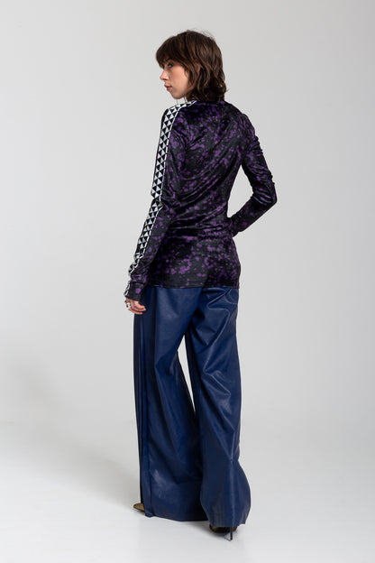 Long sleeved tunic with unique asymmetric print detail on one arm