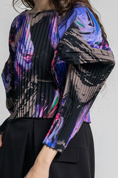 swirling crystal like printed blouse with geometric shaped long sleeves