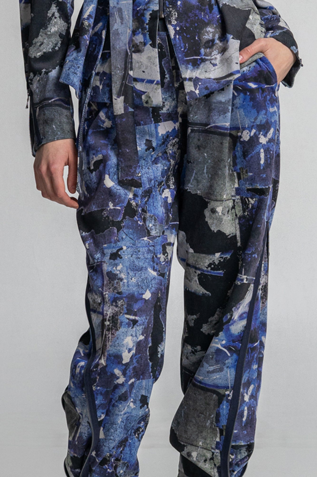 slightly elastic corduroy pants with unique hidden faces on print design