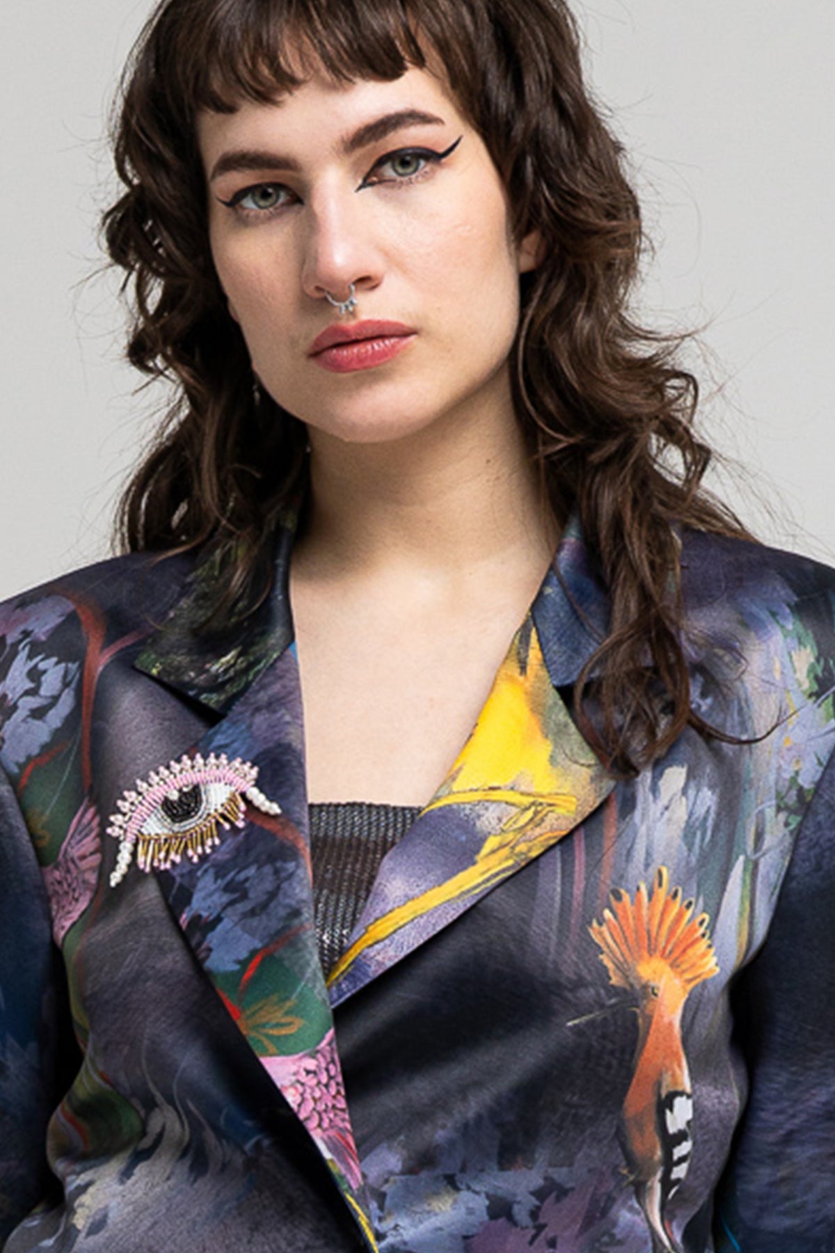 close-up of serena printed blazer to show the embellishment on right collar artista budapest