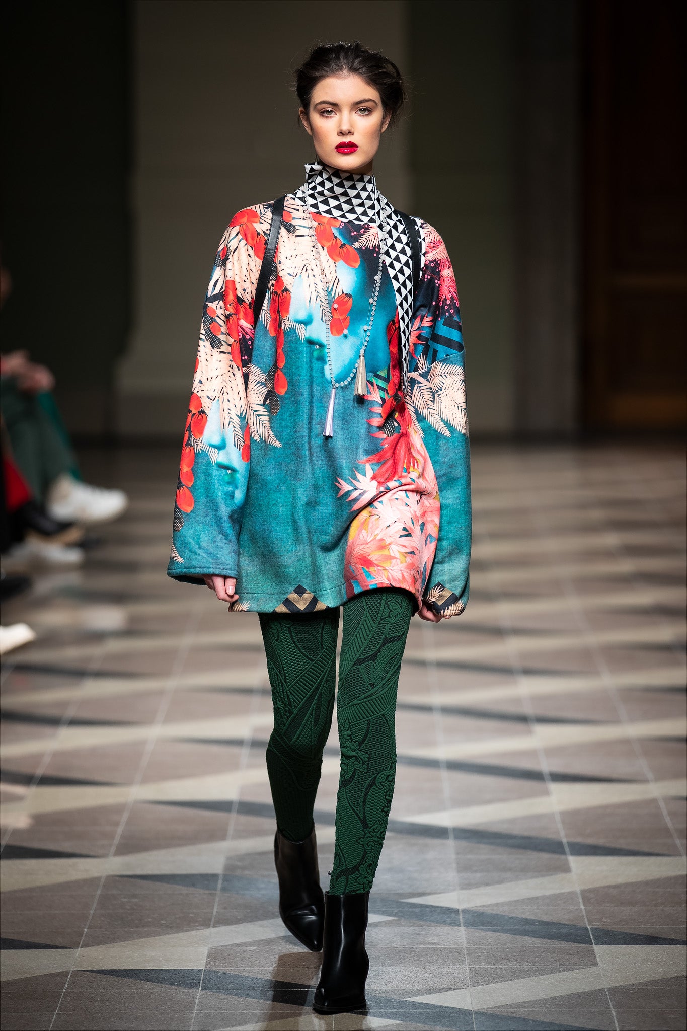 mid tigh length tunic on the runway of bcefw